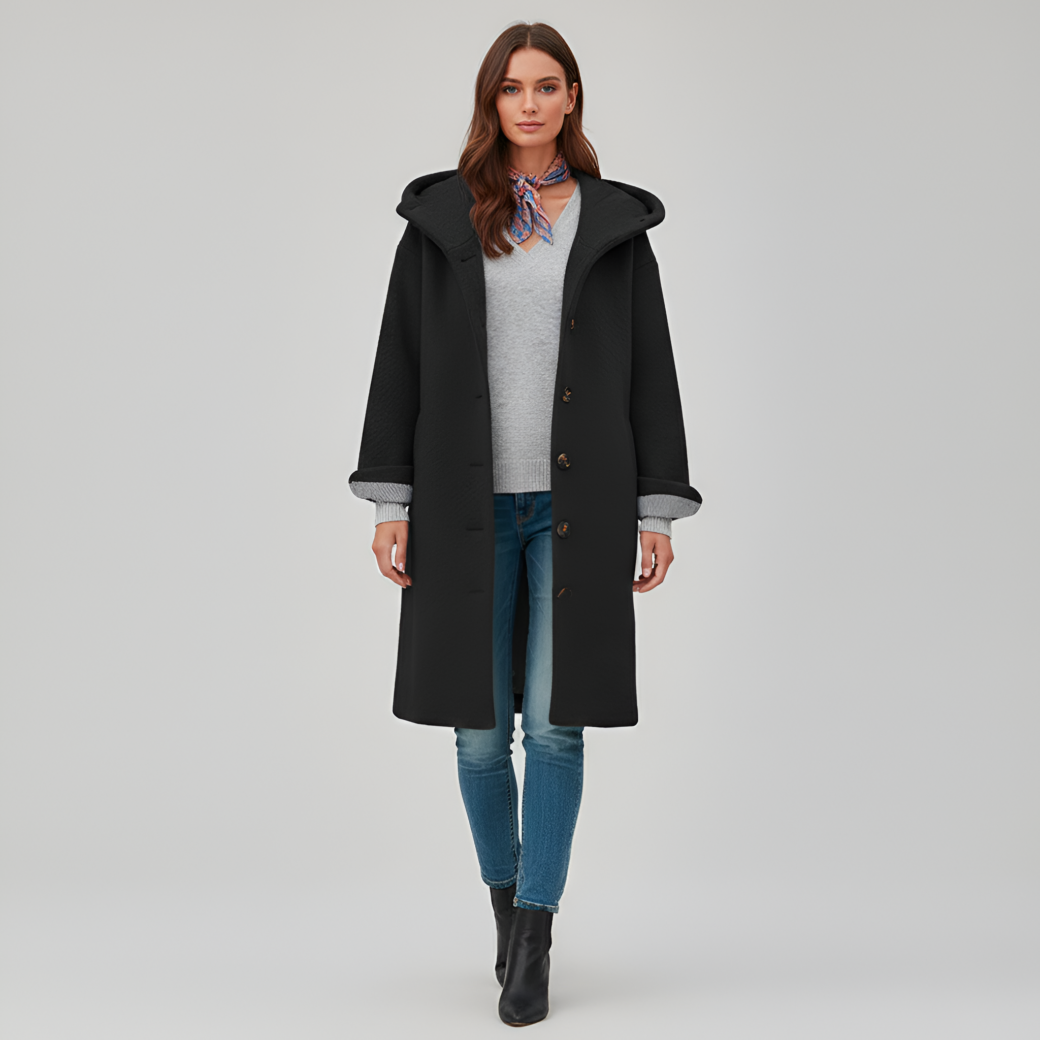 Dame uldfrakke med knaplukning og klassisk pasform